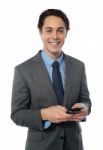 Businessman Using A Smartphone Stock Photo