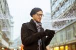 Urban Man Holdin Tablet Computer On Street Stock Photo