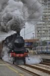 Steam Locomotive Leaving The Station Stock Photo