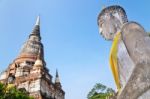 Buddha Statue And Ancient Pagoda Stock Photo