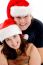 Young Couple Wearing Christmas Hat