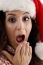 Shocked Girl Wearing Santa Hat