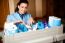 Staff Arranging Toiletries In Cart