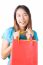 Asian Woman Holding Shopping Bag