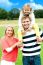 Smiling Family Enjoying In Outdoors