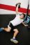 Young Man Lifting Kettlebell