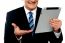 Cropped Image Of A Businessman Holding Tablet Pc