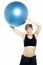 A Healthy Woman Lifting Big Swiss Ball