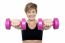 Lady Holding Pink Dumbbells. Arms Outstretched