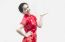 Asian Chinese Woman In Traditional Chinese Cheongsam Gesturing