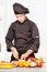 Chef In Black Uniform Cutting Fruit