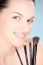 Woman And Make Up Brushes