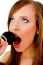 Close View Of Woman Singing Into Karaoke