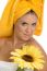 Posing Smiling Sexy Female In Towel With Sunflower