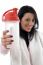 Portrait Of Smiling Woman Posing With Water Bottle