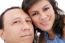 Closeup Portrait Of A Sweet Young Couple Smiling Together