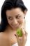 Portrait Of Smiling Female Holding Apple