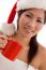 Young Woman With Christmas Hat Holding Coffee Mug