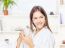 Woman In Bathrobe Relaxing At Home