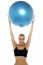 Fit Young Lady Holding Up Big Blue Pilates Ball