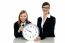 Pretty Student Holding Clock With Her Teacher