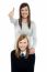 Cute Schoolgirl With Her Mom. Mother Gesturing Thumbs Up