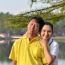 Happy Mother And Father In The Park