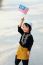 Young Boy Holding Flag