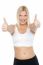 Fit Woman In Sports Bra Gesturing Double Thumbs Up