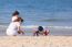 Asian Family On Beach