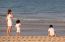 Asian Mom And Son On Beach