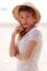 Woman In Beautiful Hat On Beach