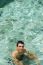 Young Man Relaxing And Smiling In Maldives (ocean Background)