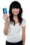 Happy Young Woman Showing Credit Card