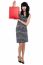 Stylish Young Lady Presenting Shopping Bag