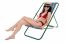 Glamorous Bikini Model Relaxing On Reclining Chair