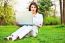 Woman With Laptop In Park