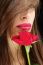 Woman And Wet Red Rose Near Her Lips