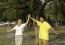 Portrait Of Happy Family In Park