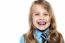 Face Closeup Of A Cheerful Young School Girl