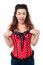 Excited Woman Adjusting Her Polka Dotted Corset Top