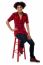 Casual Young Woman Sitting On Stool