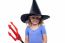 Pretty Girl In Witches Hat Holding Devils Pitchfork