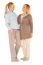 Smiley Grandmother And Young Mother Standing On White Background