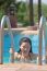 Beautiful Happy Woman In A Swimming Pool