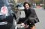 Businessman Repairing Car Roadside