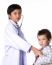 Two Boys Playing A Doctor