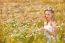 Blond Girl On The Camomile Field