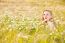 Blond Girl On The Camomile Field