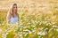 Blond Girl On The Camomile Field